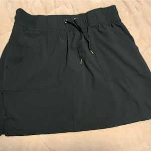 Athletic skirt with shorts attached. Very cute, pockets.